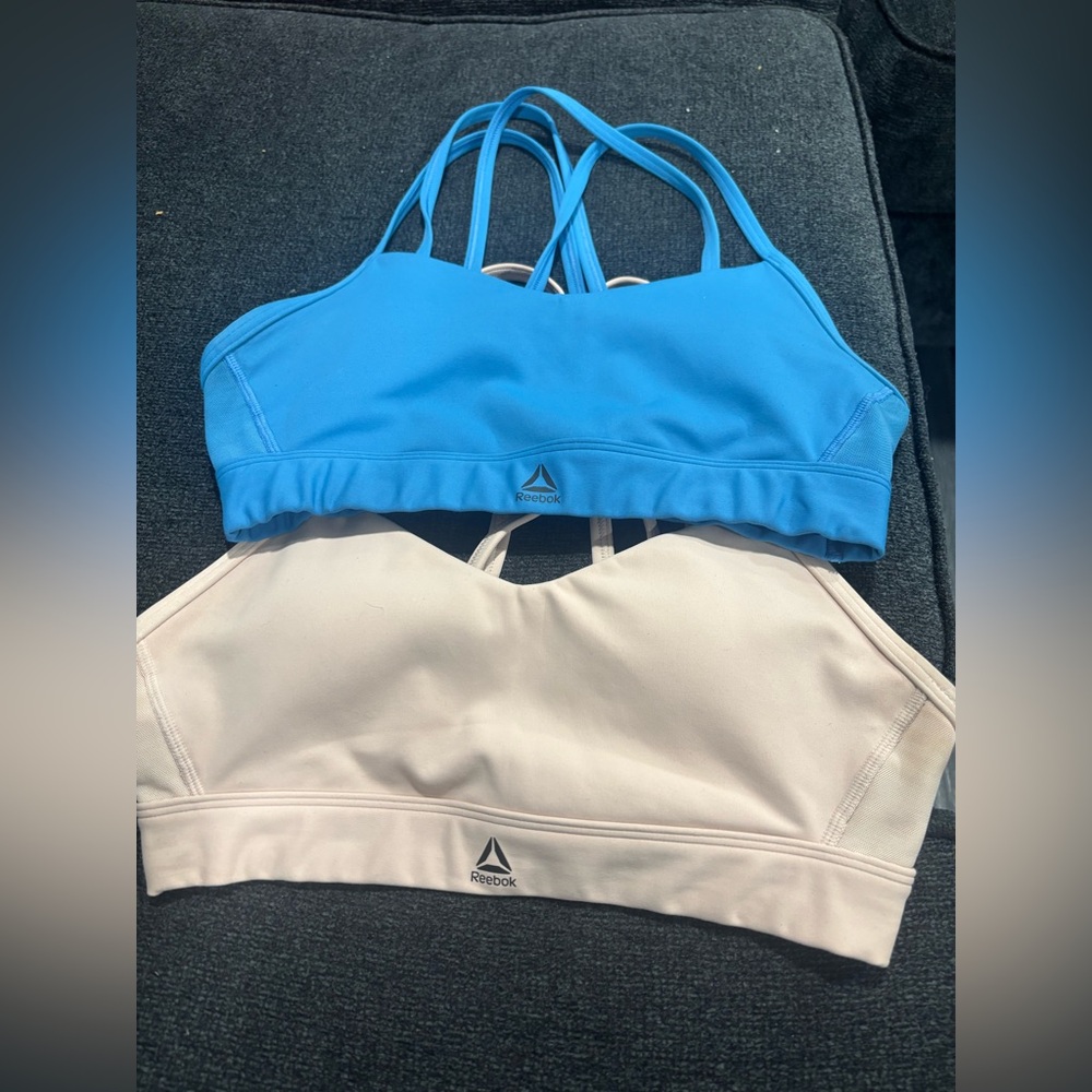 Pack of 2 Reebok sports bras, small, blue and light pink